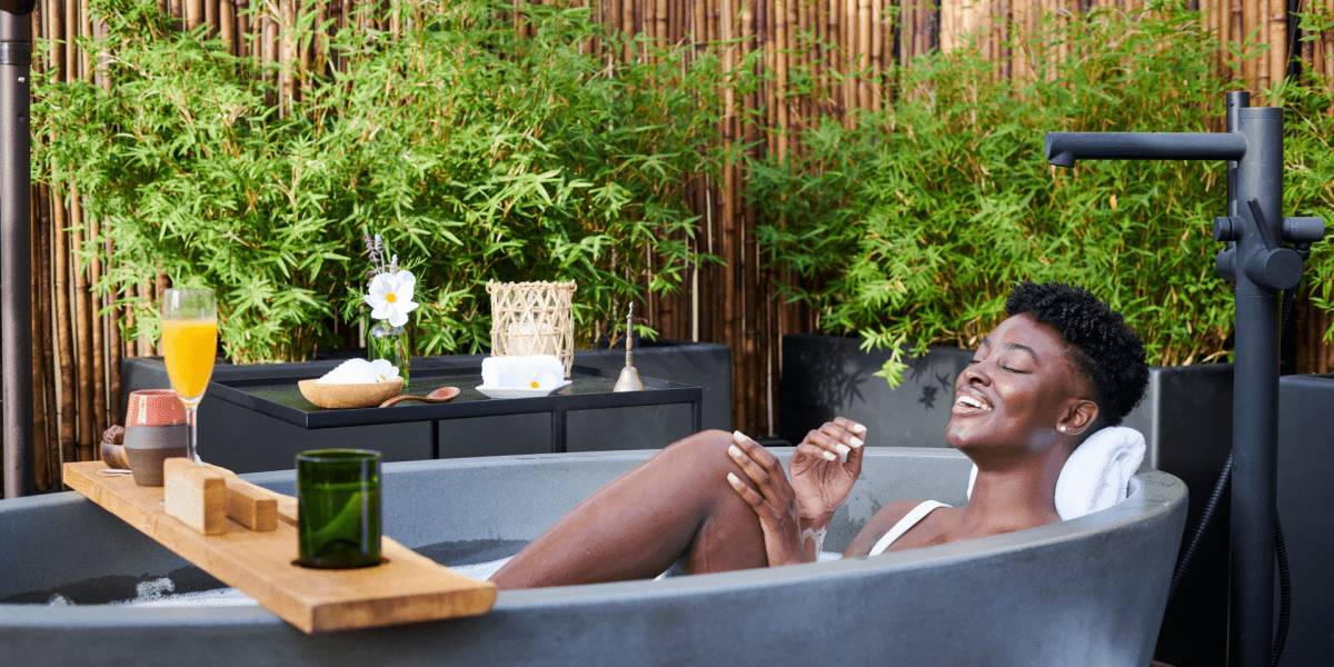 Woman in Bamford rooftop tub 